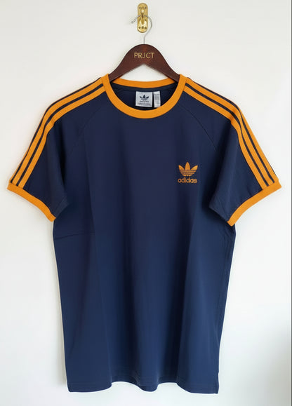 The Classic "Adidas 3-Stripe Tee" ...